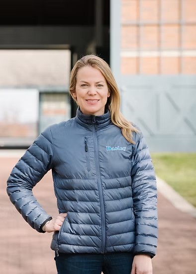 Woman in blue puffer coat