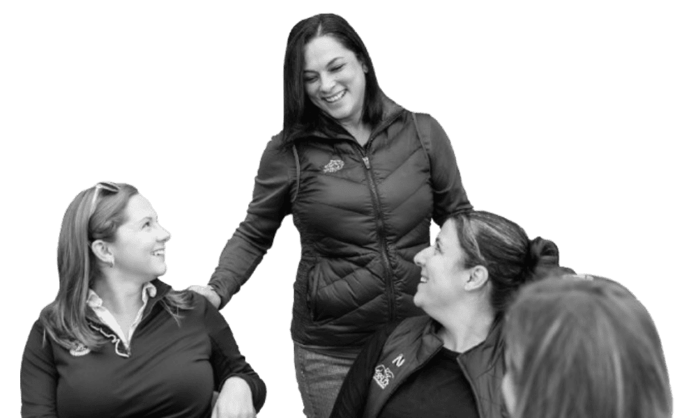 women chatting one standing 3 sitting